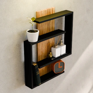Modern black and wood wall shelf with decor.
