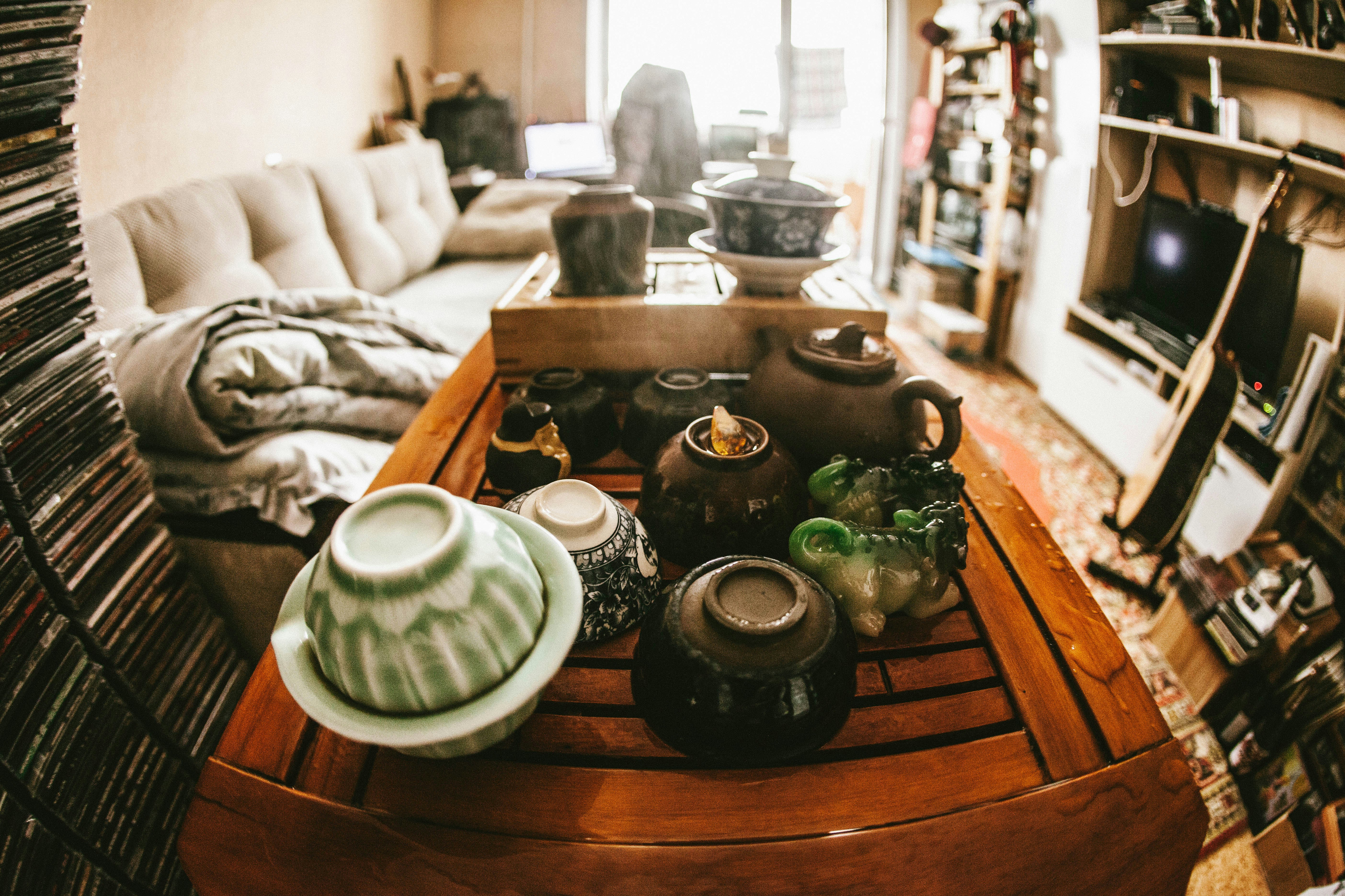 Tea set on a wooden tray in a cozy room