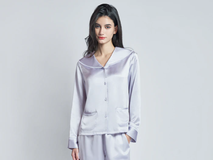 Model in a lilac silk pyjama set
