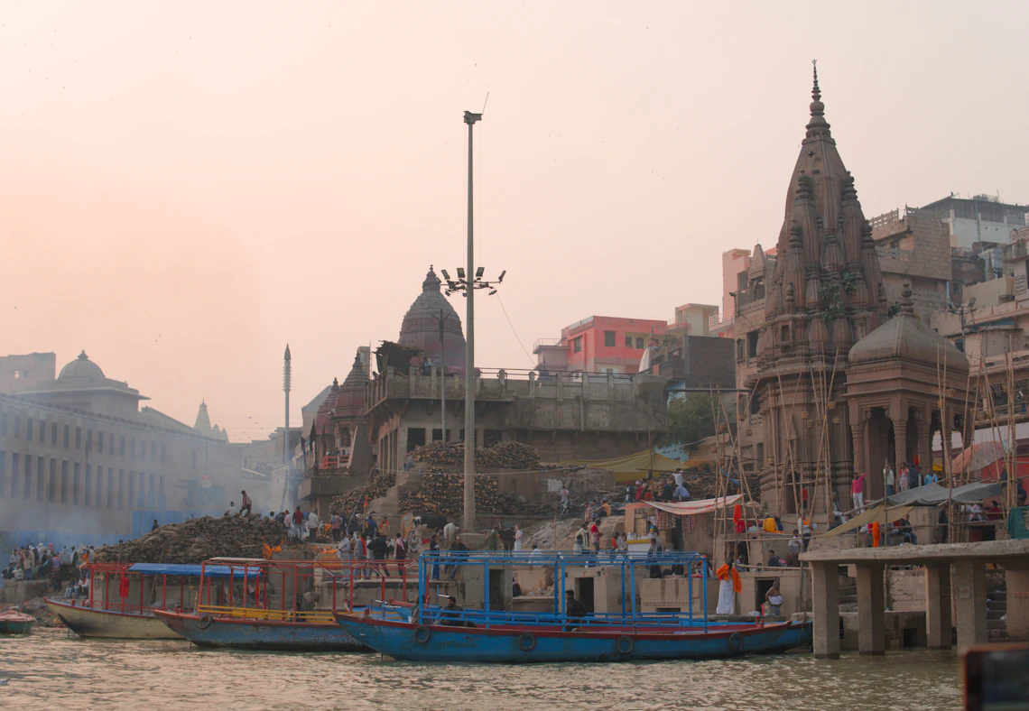 Ancient temples alongside the Ganges at sunrise