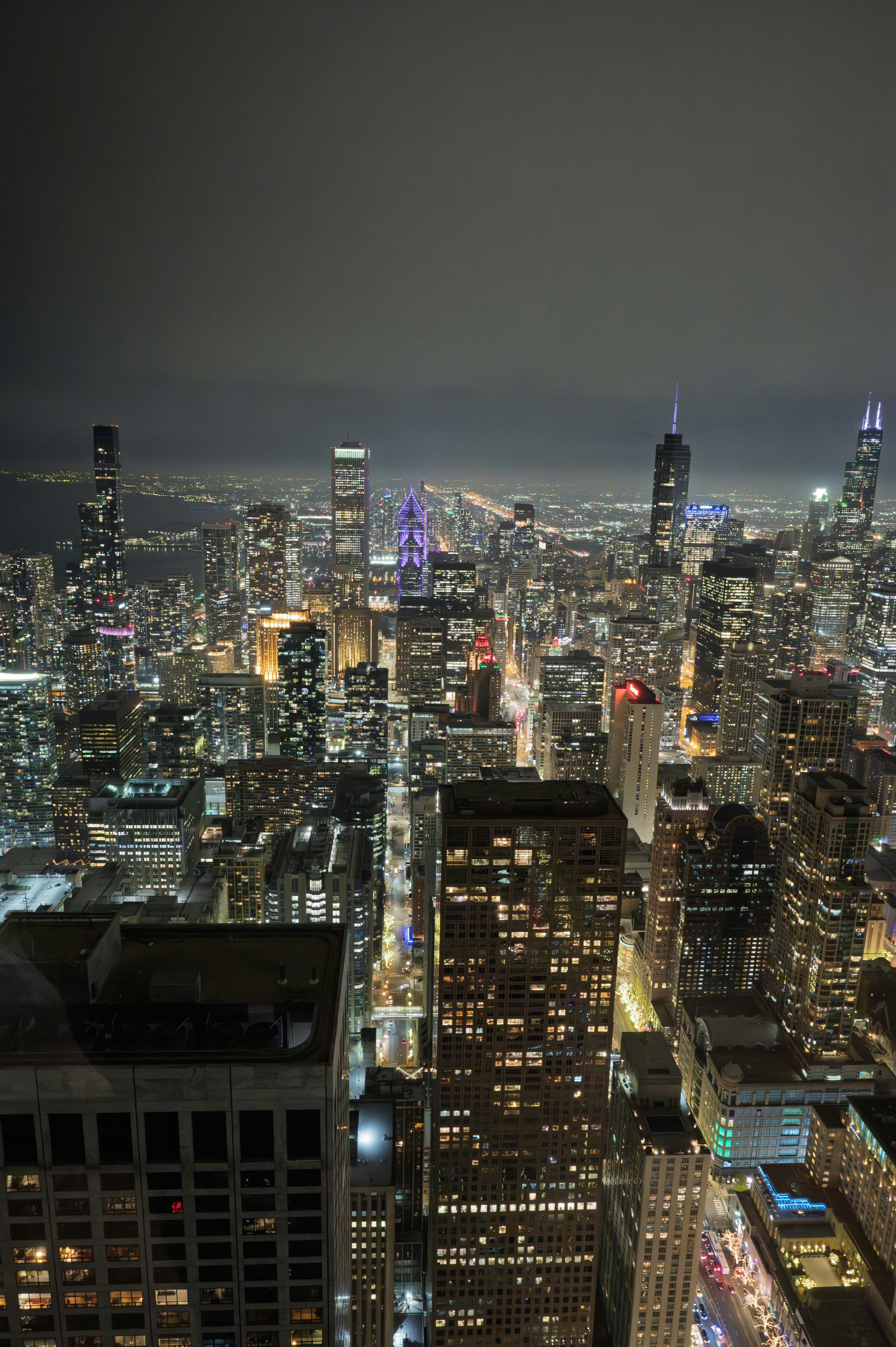 Vibrant cityscape with illuminated skyscrapers at night