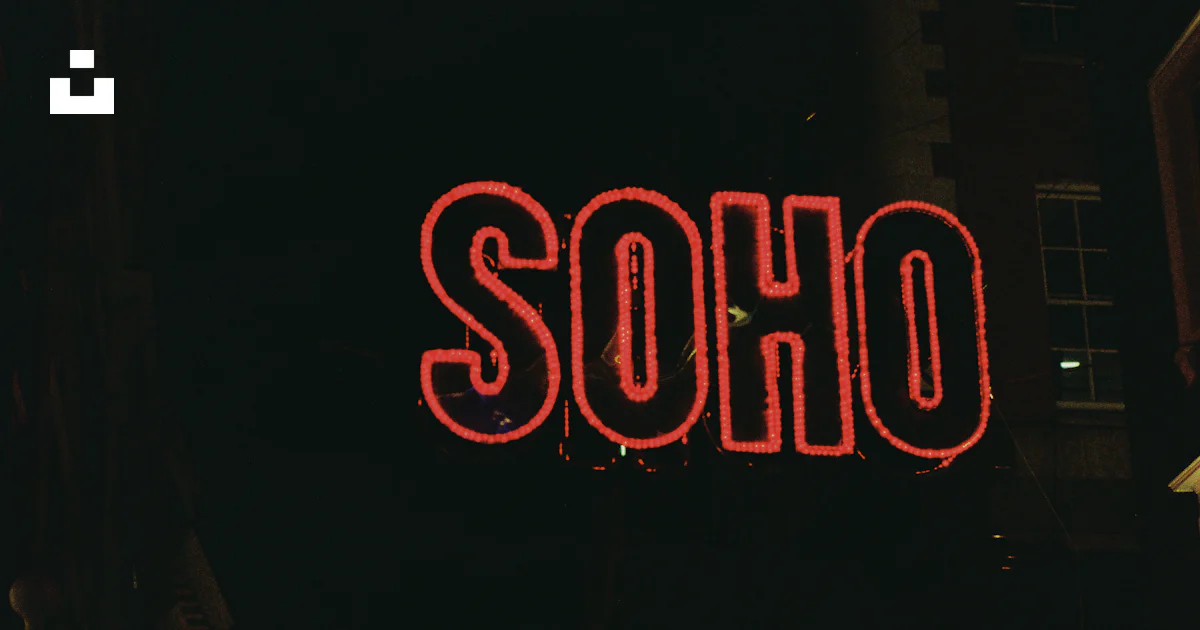 Soho Sign Sample Neon soho sign illuminates dark city street at night. photo – Free Film ...