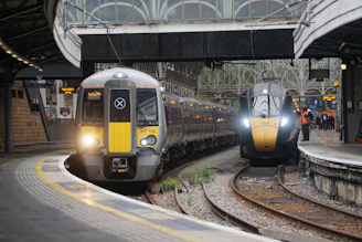 Two trains at a station platform