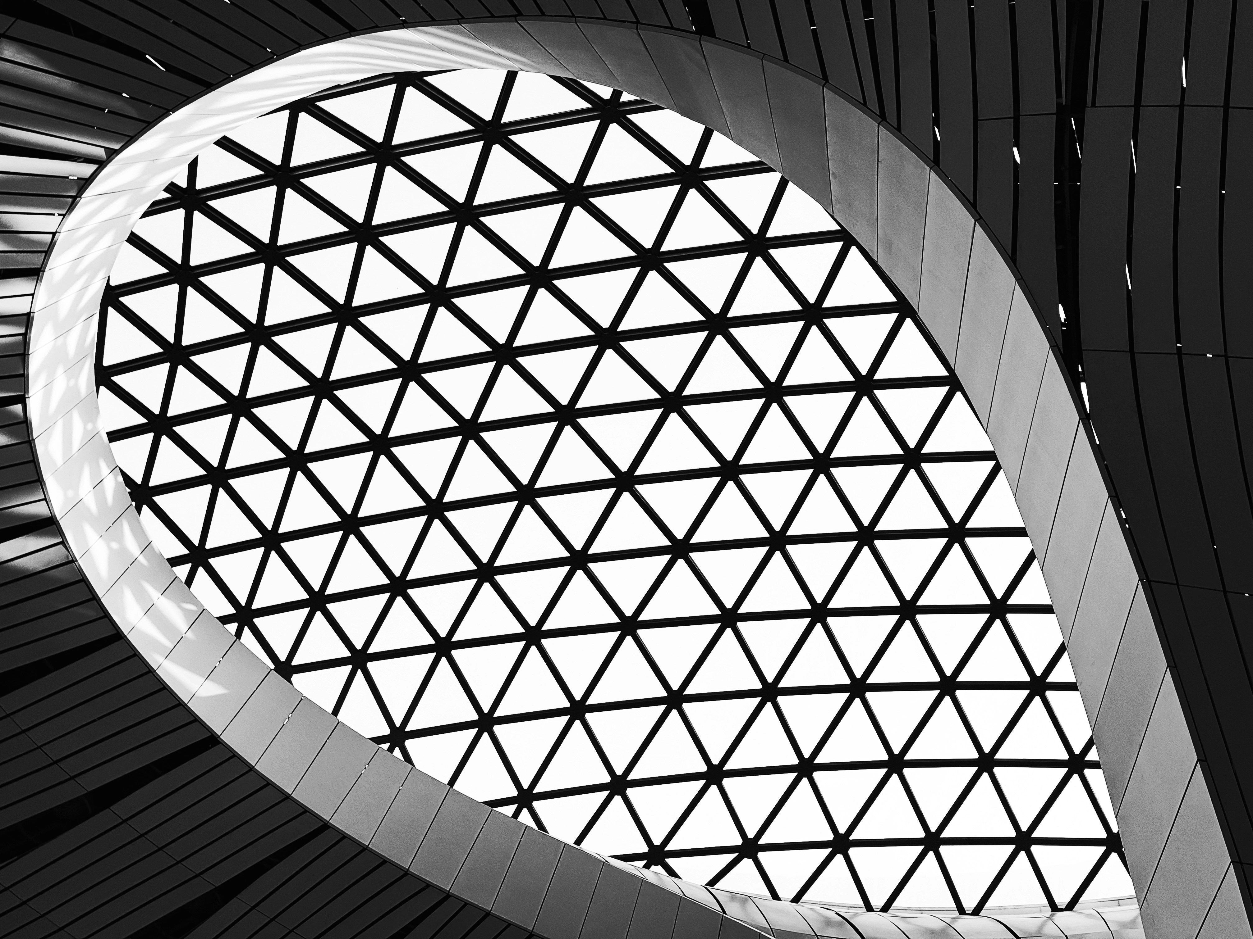 Triangular geometric pattern in a modern building structure.