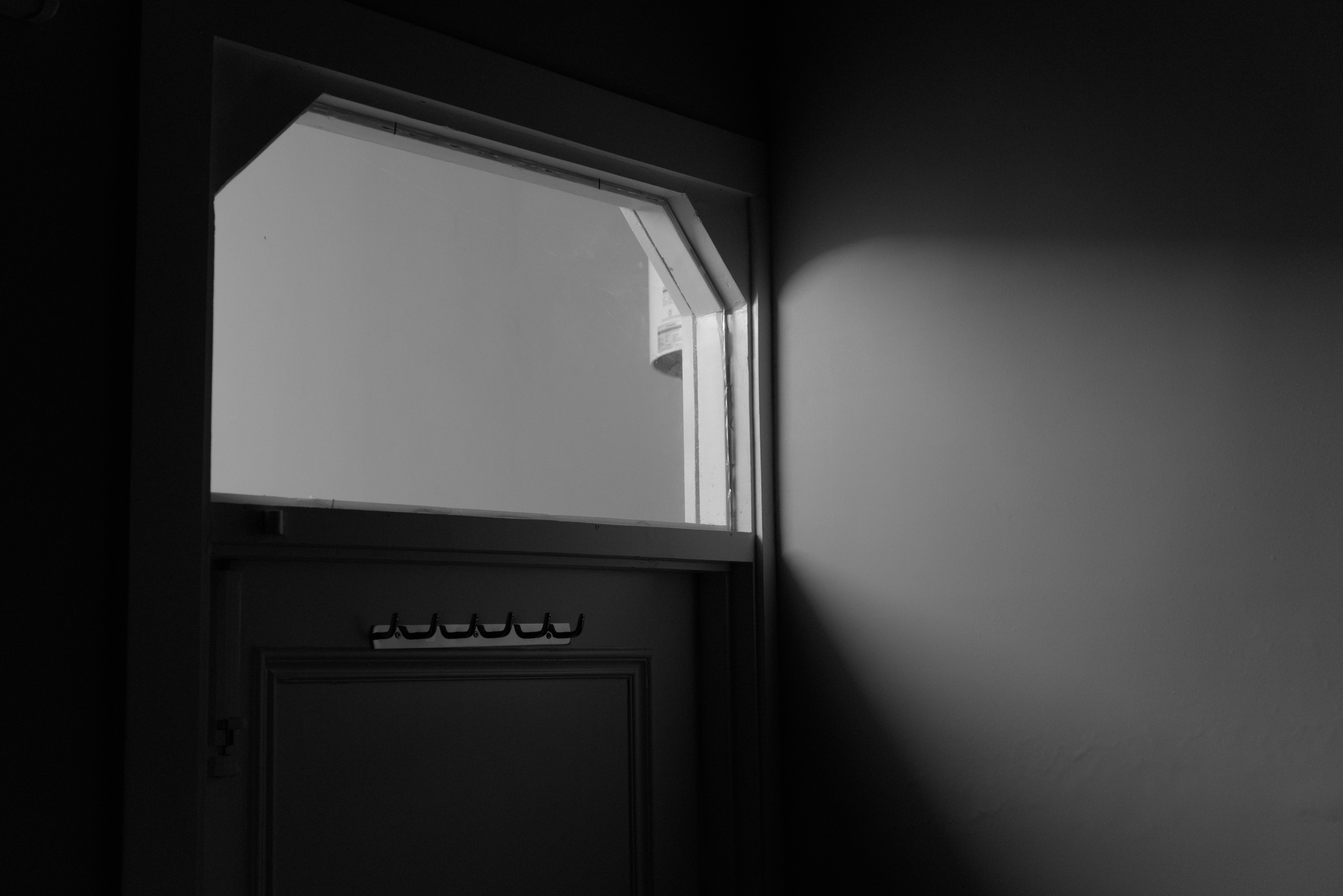 A window with a view to a gray sky