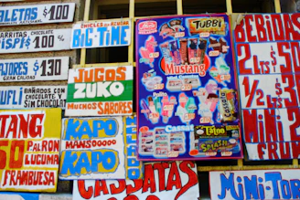 Colorful signs advertise ice cream and drinks.