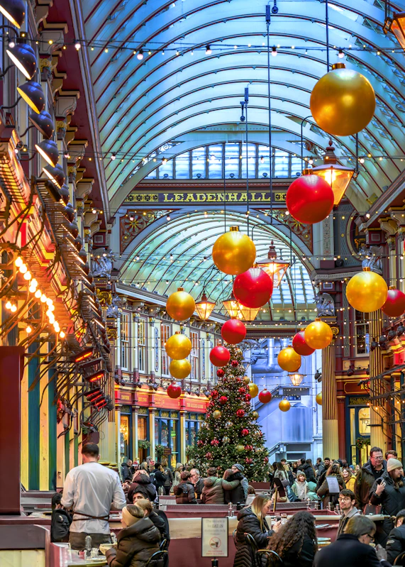 Christmas decorations adorn a bustling market hall