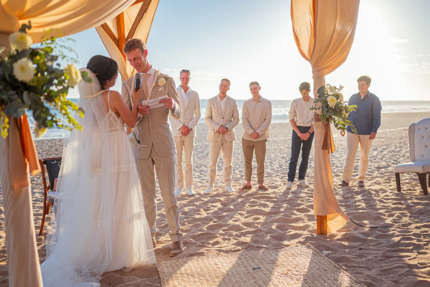 How to handle unexpected delays during ceremonies — A bride pauses during a ceremony delay while guests wait patiently.