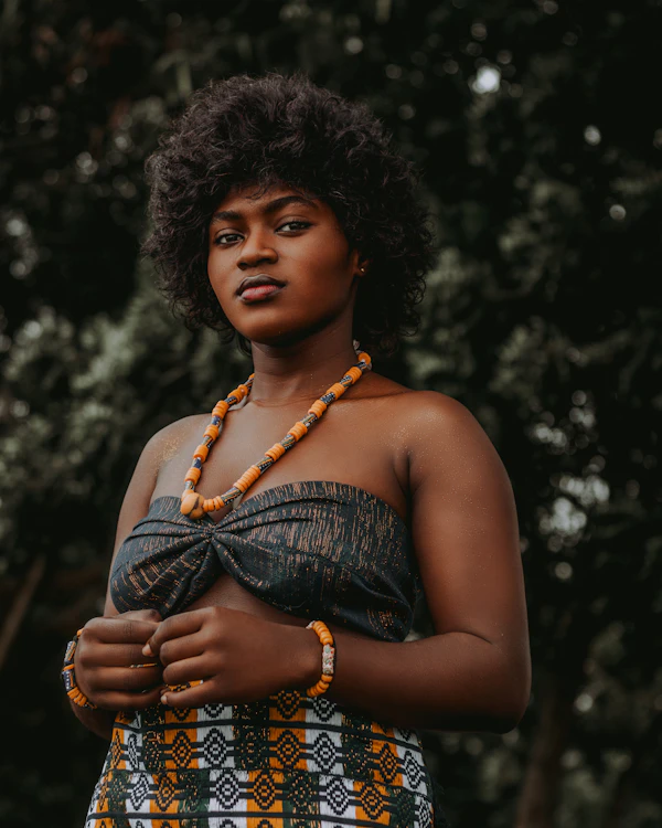 @adaora.k wearing Kente blouse