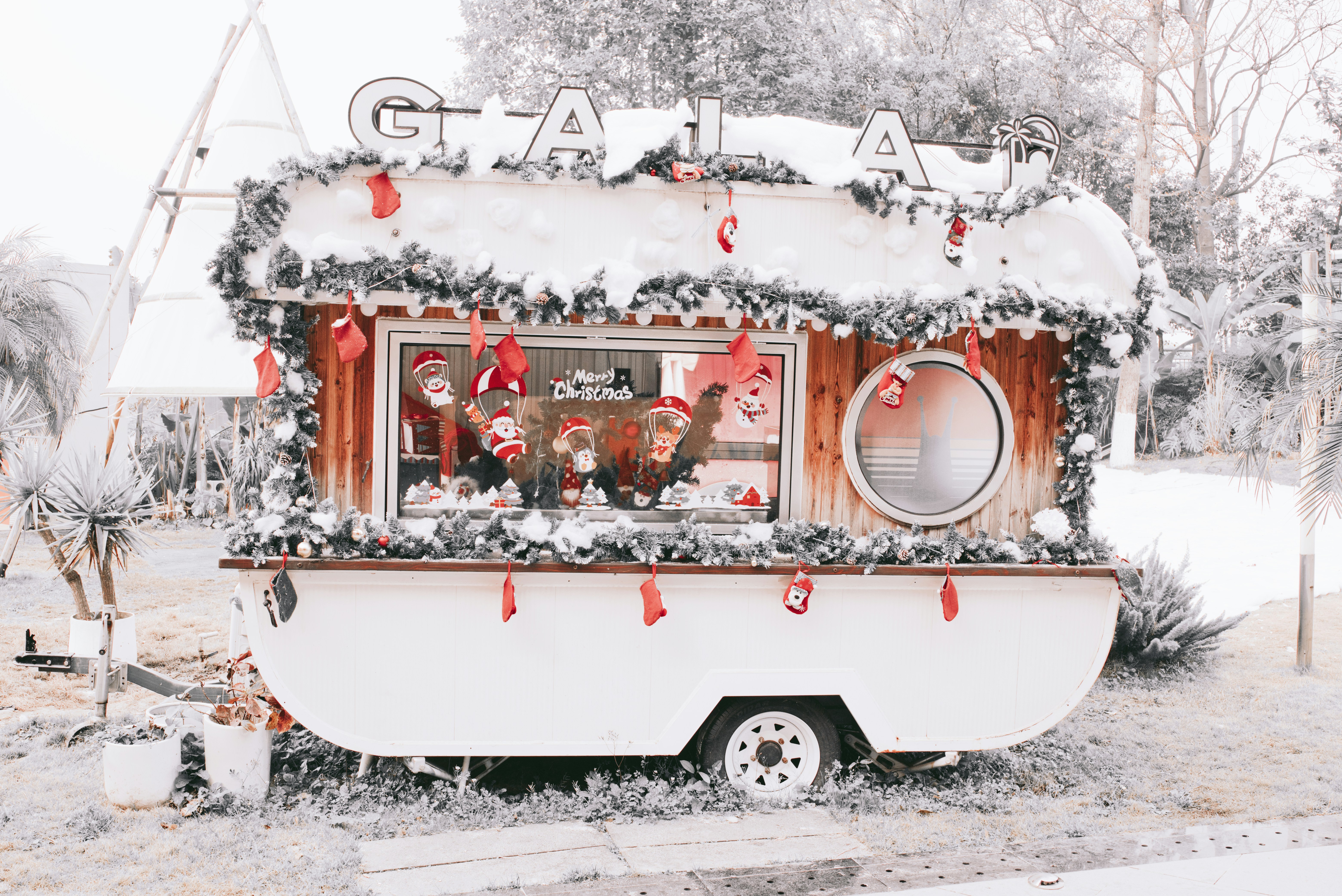 A vintage trailer decorated for christmas