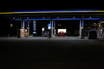 Gas station at night with blue lighting