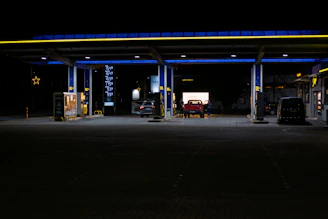 Gas station at night with blue lighting