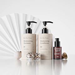 Two bottles of shampoo and conditioner with argan oil.