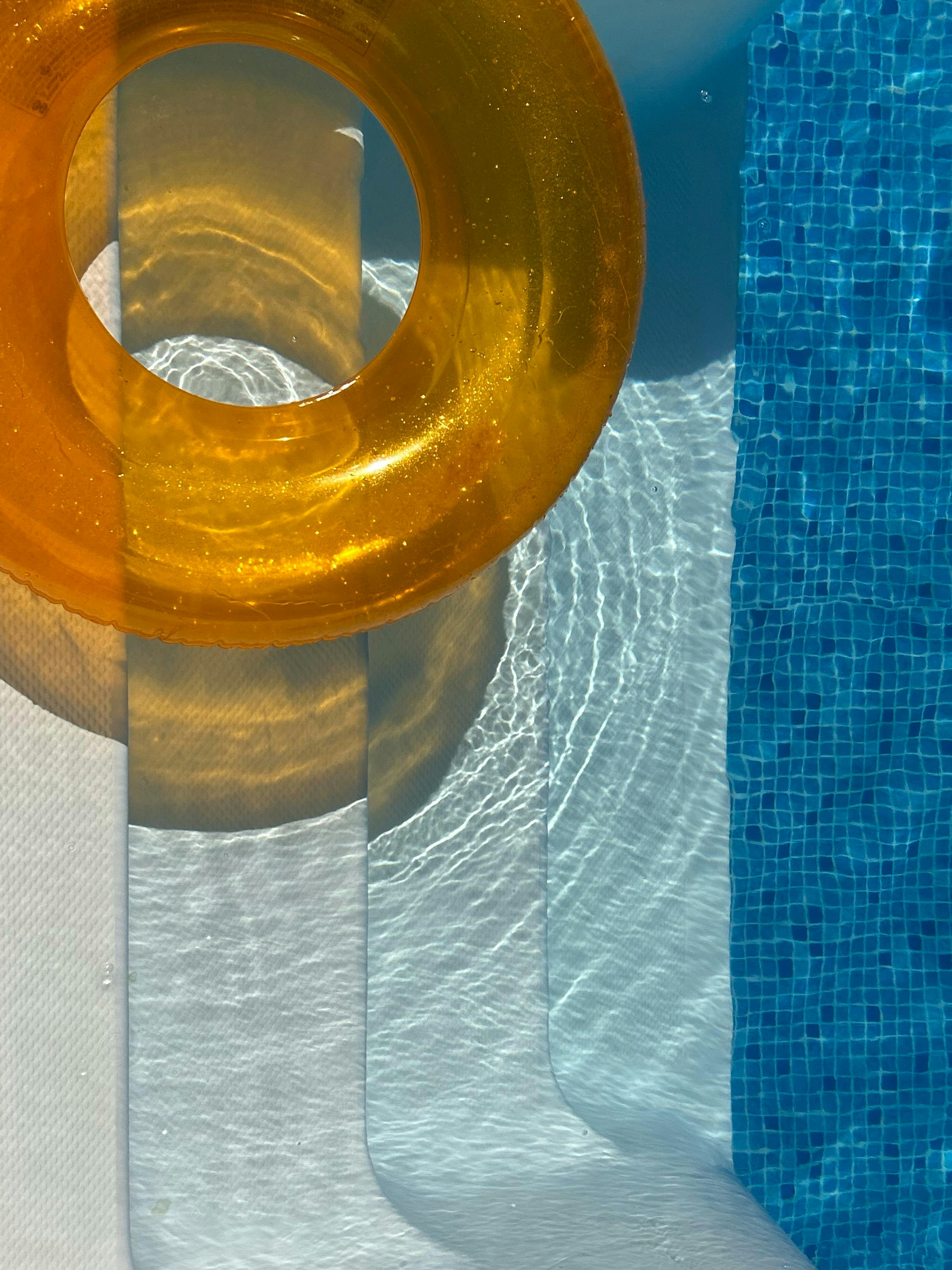 Orange inflatable ring floating in a swimming pool. photo – Free Summer ...