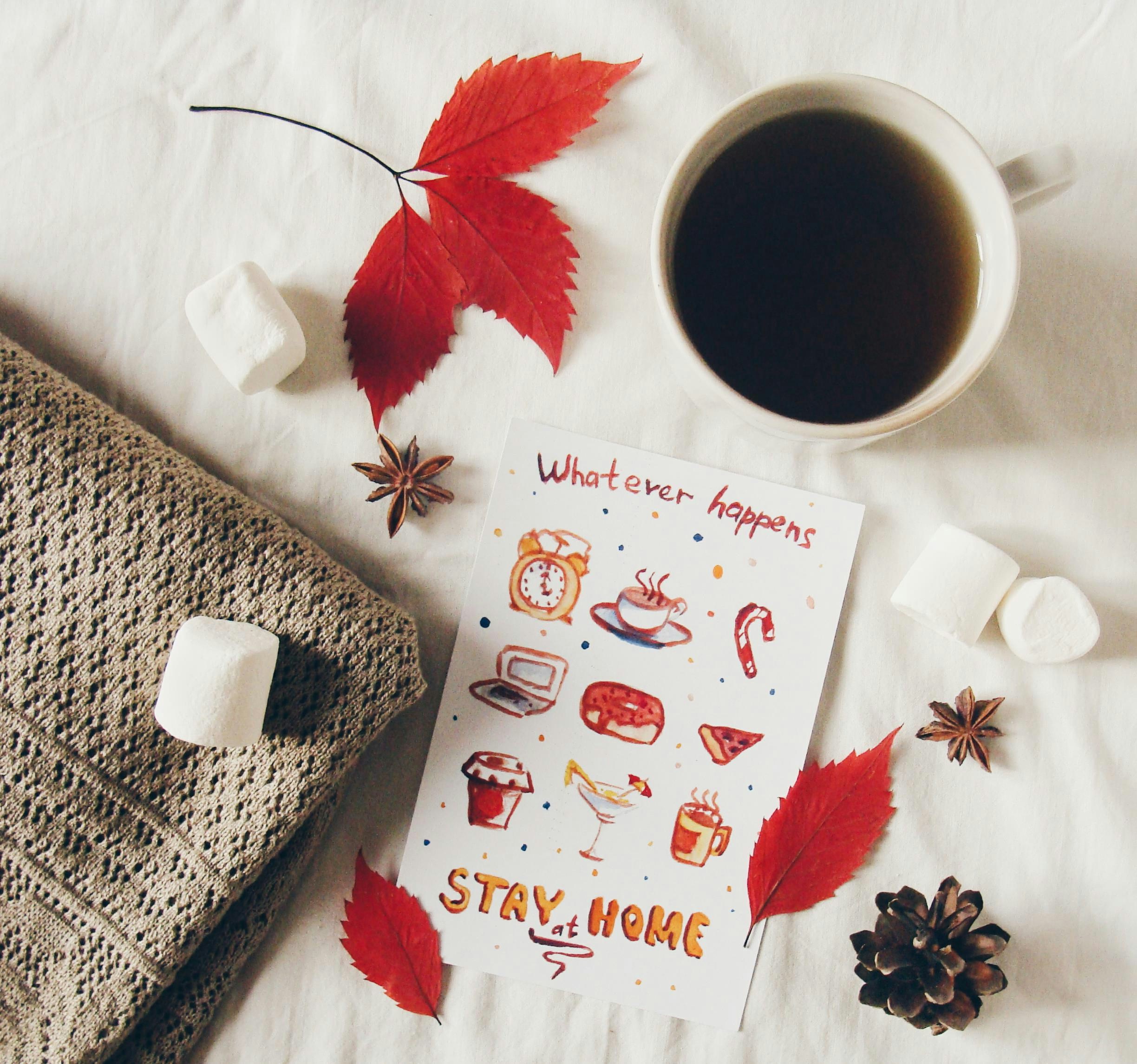 Cozy autumn scene with coffee and fall decorations