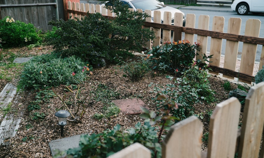 Terraced Belgard retaining wall with steps and capstone - before