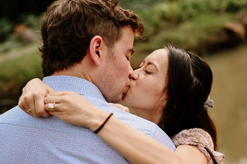 Herpes-positive couple sharing a tender kiss