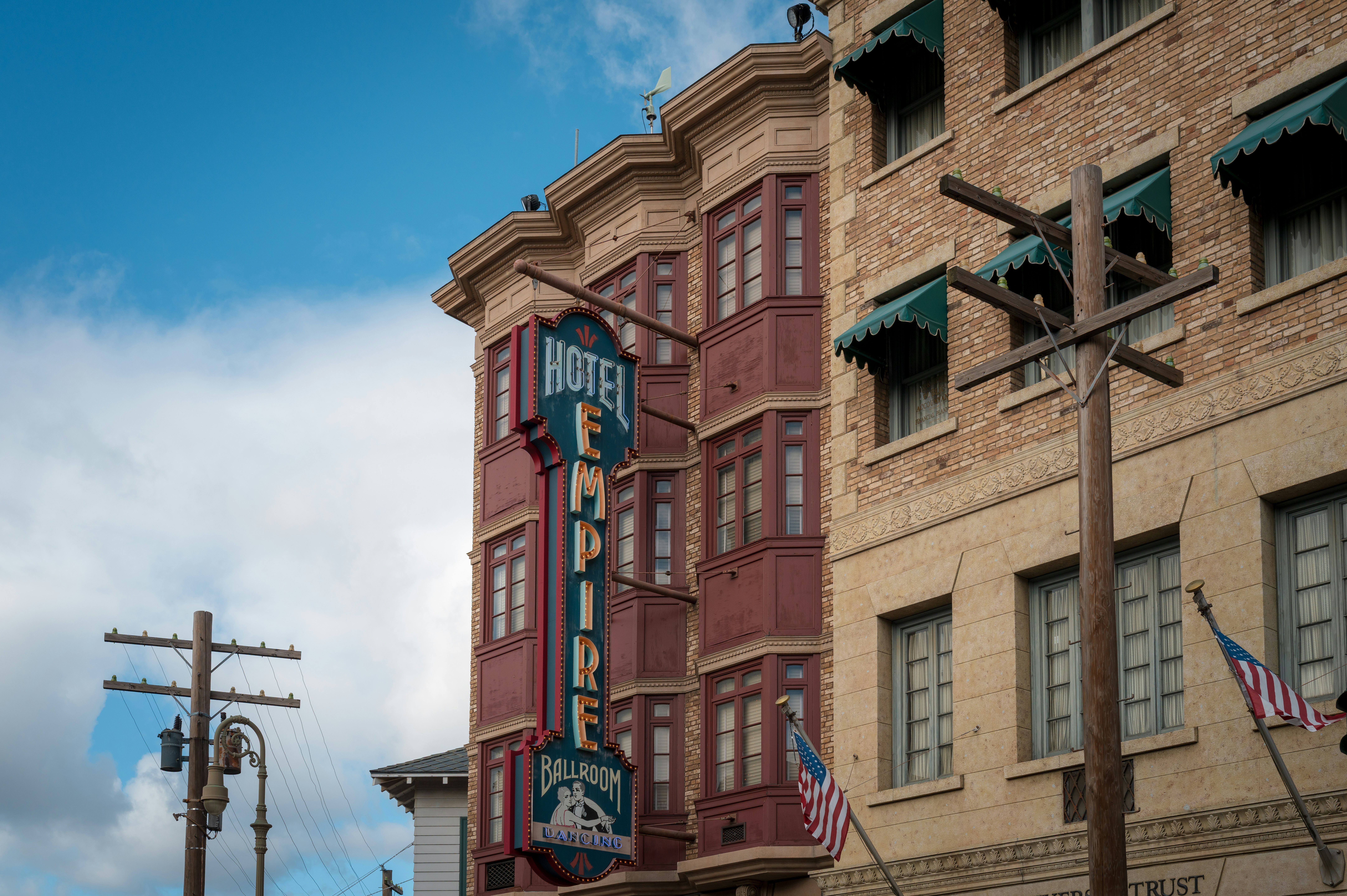 Empire hotel sign on brick building facade