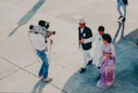 Cameraman films dignitaries arriving at event