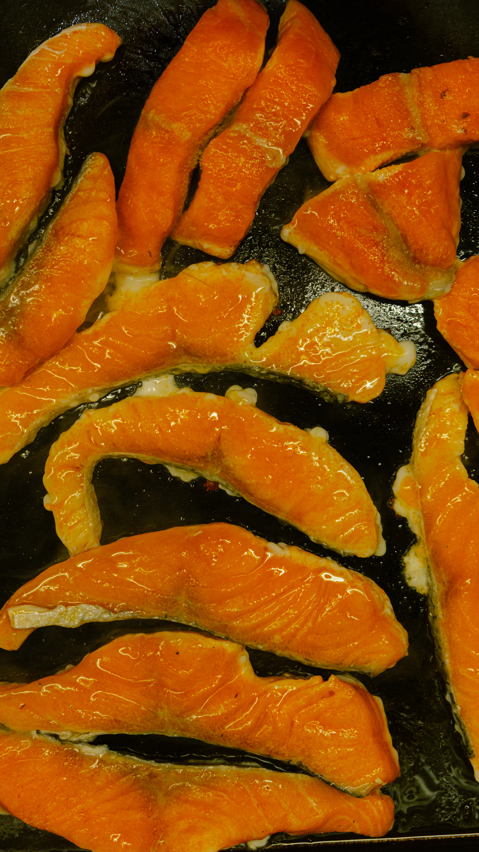 Pan-seared salmon fillets with garlic butter and vegetables