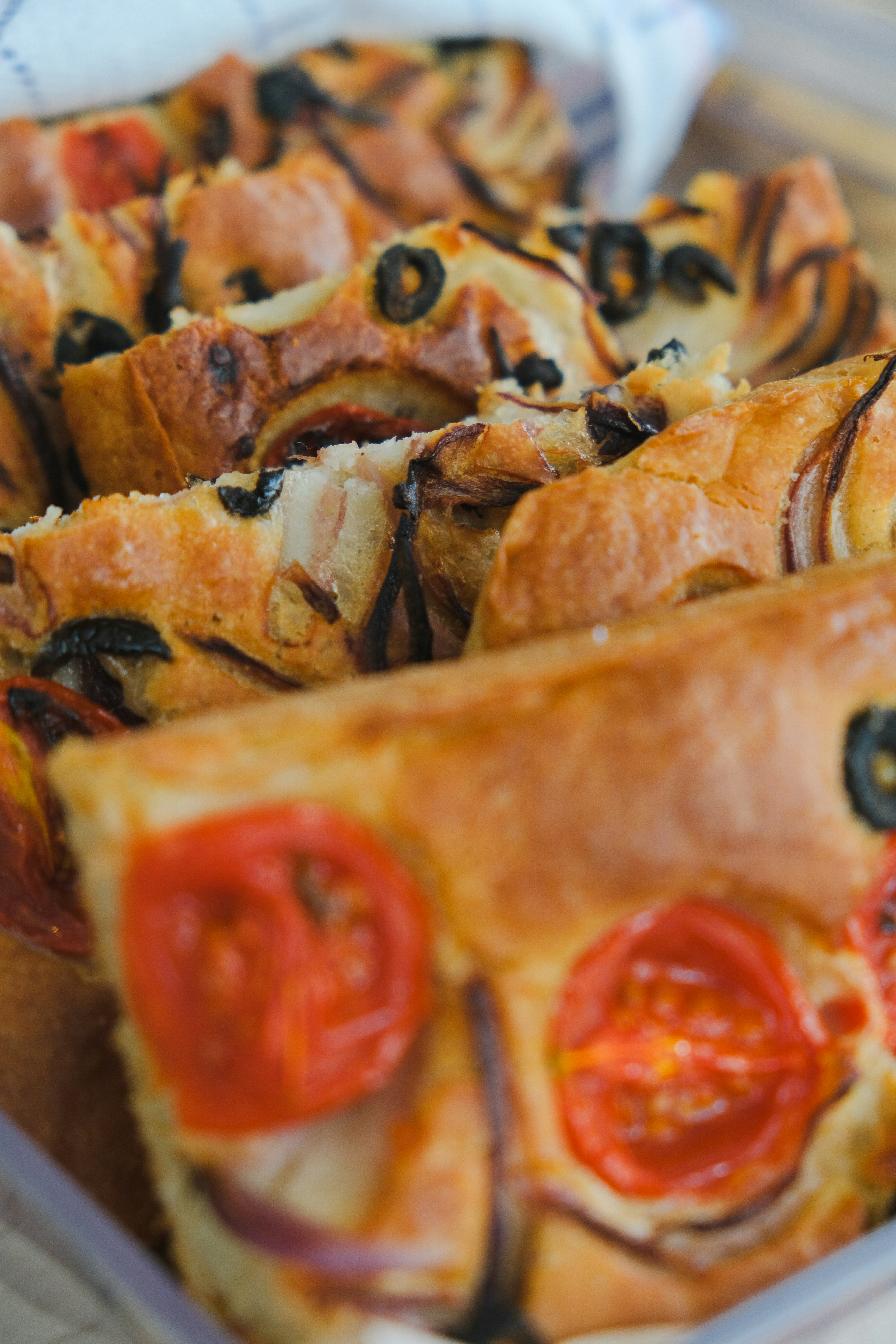 Focaccia bread with tomatoes and olives