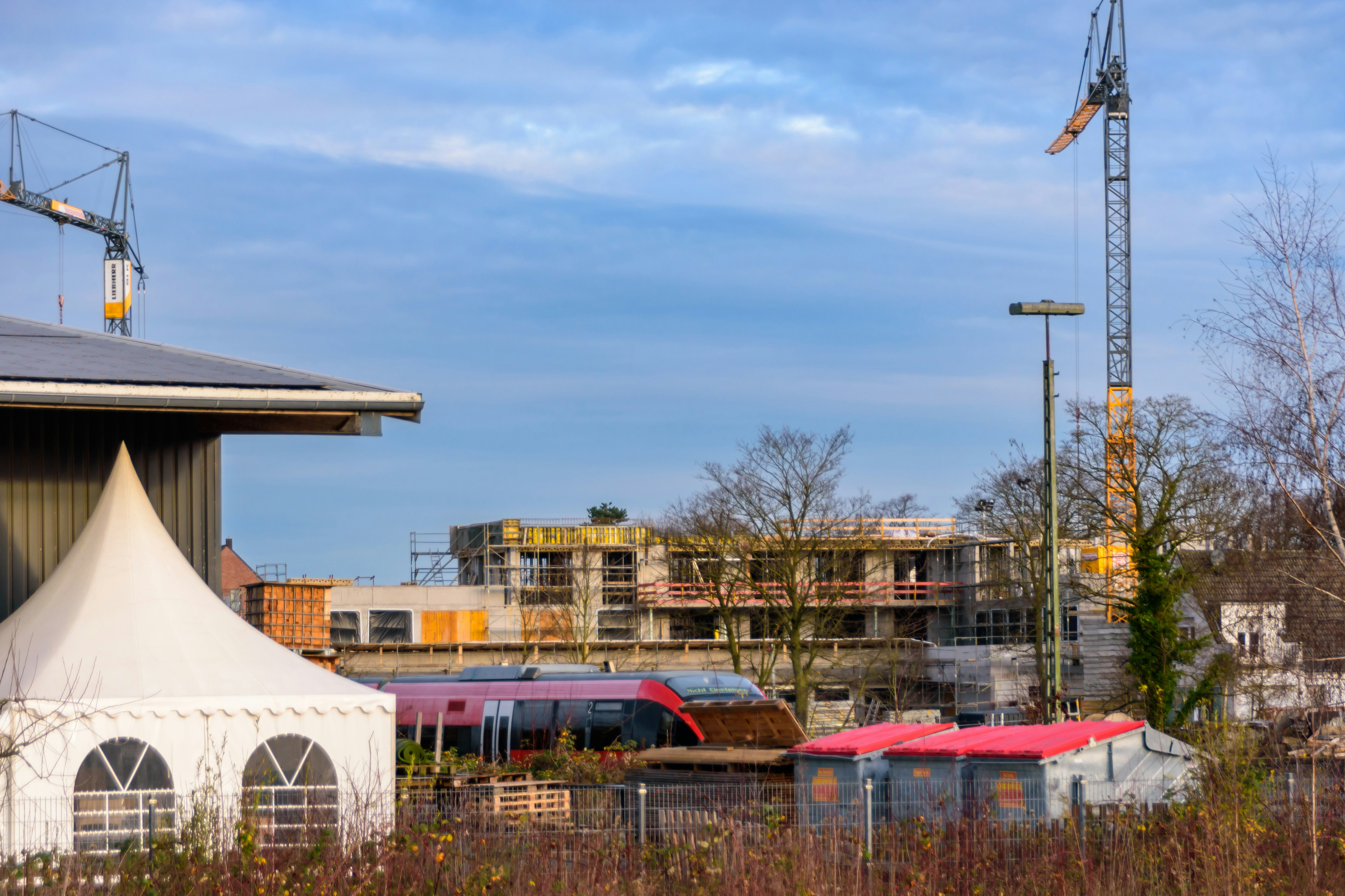 Construction site with cranes and buildings under development