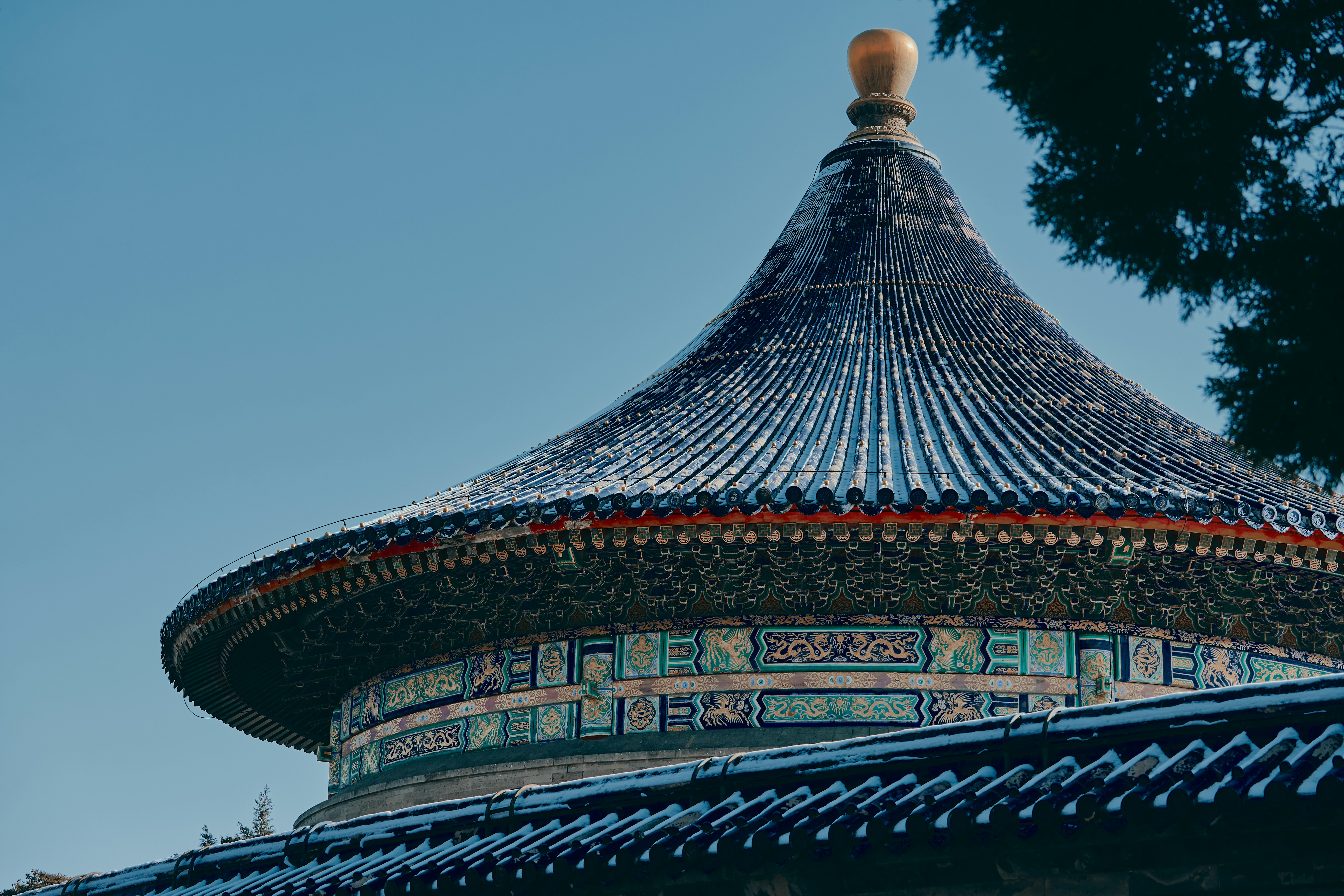 Traditional chinese temple roof covered in snow