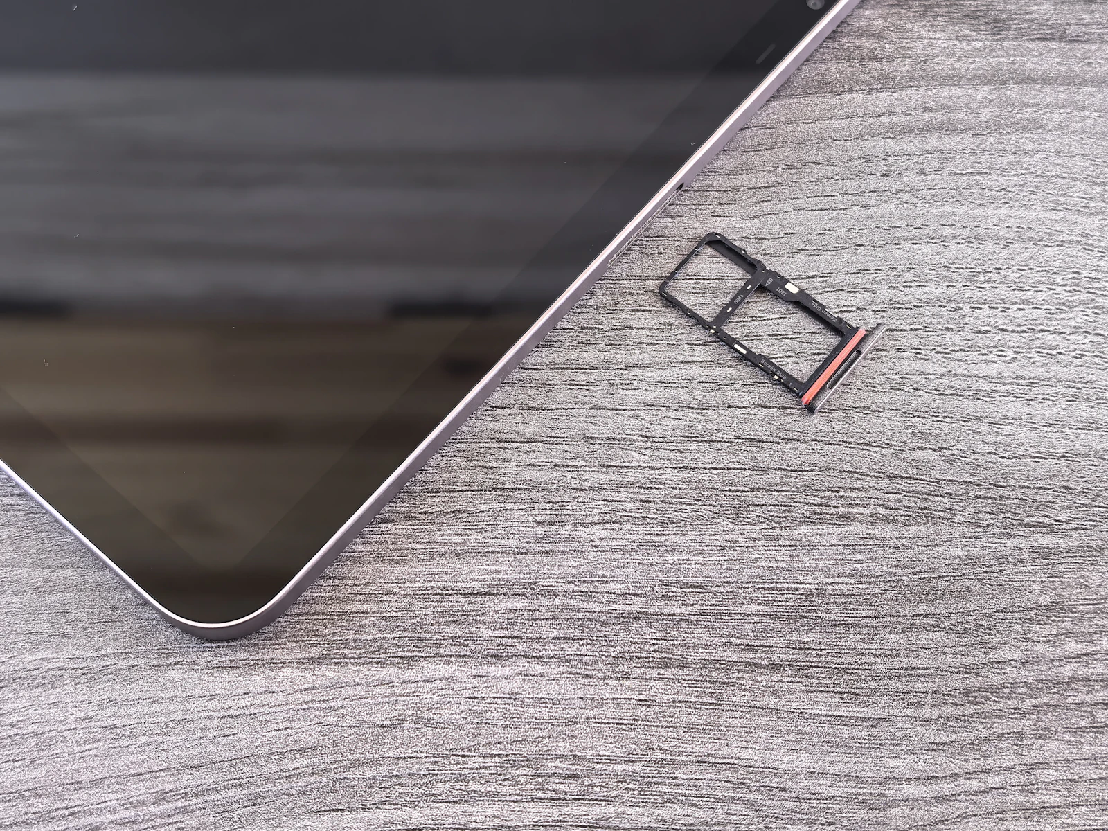 Smartphone with its SIM card tray removed