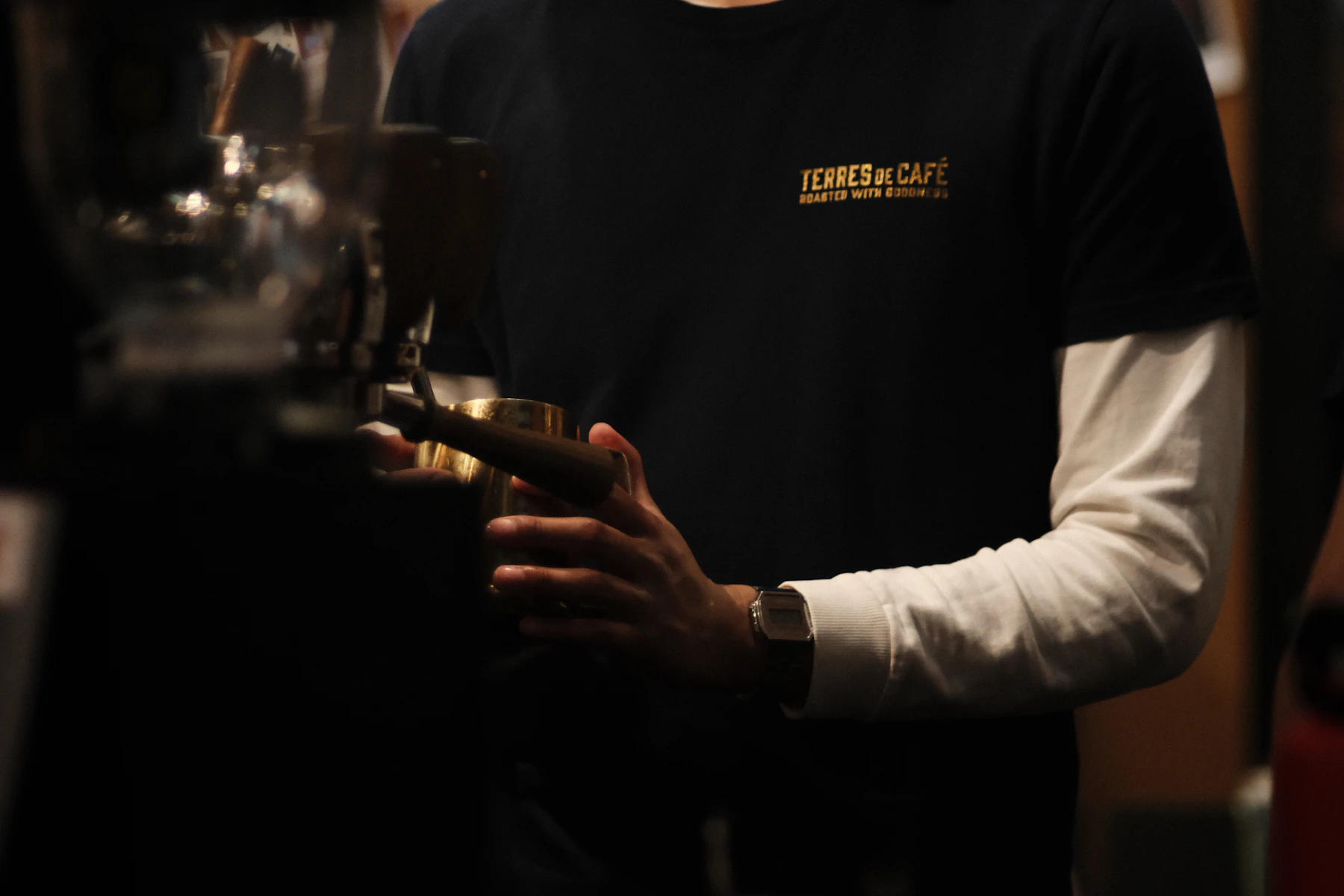 Barista working with an espresso machine