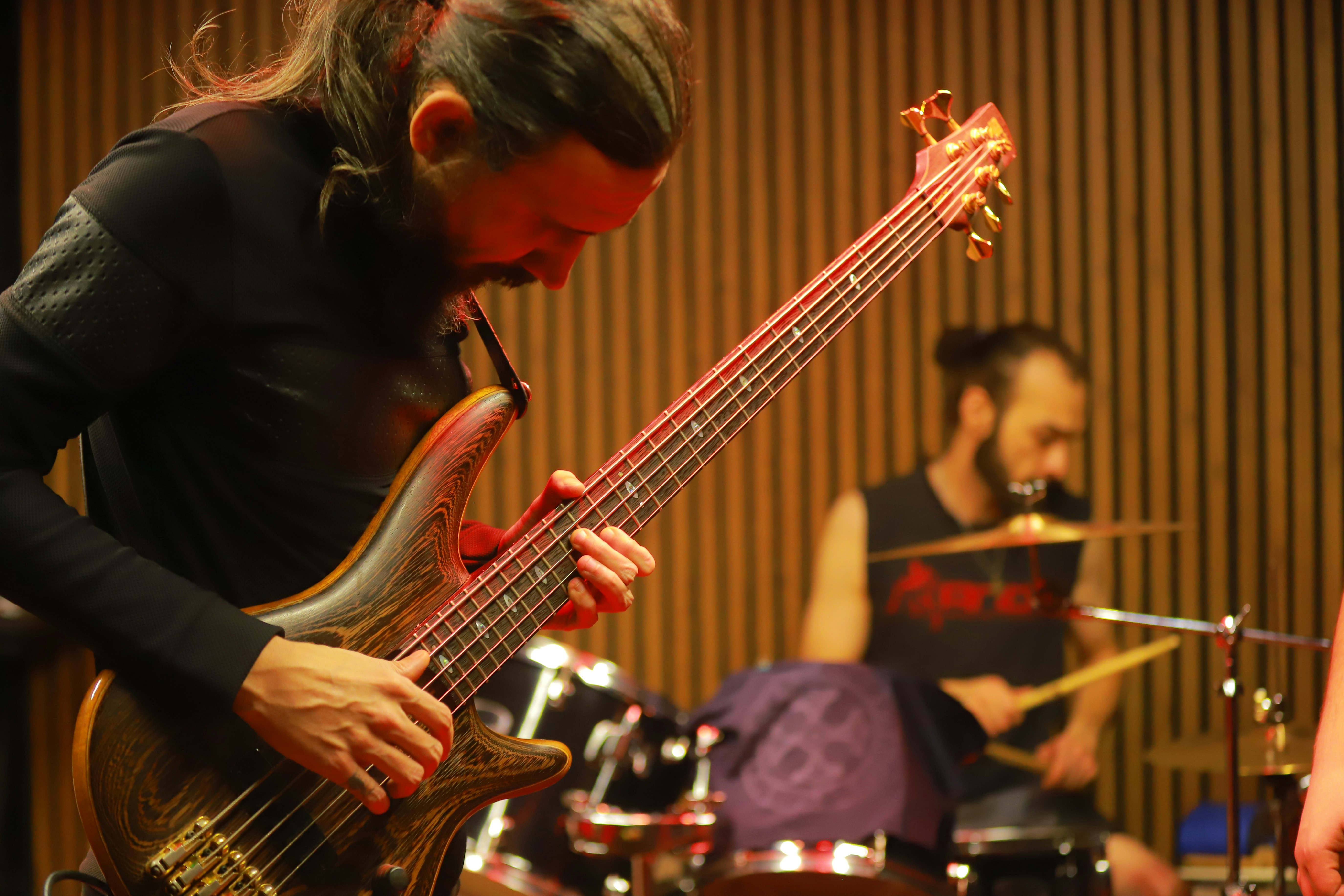 Musicians playing instruments in a studio