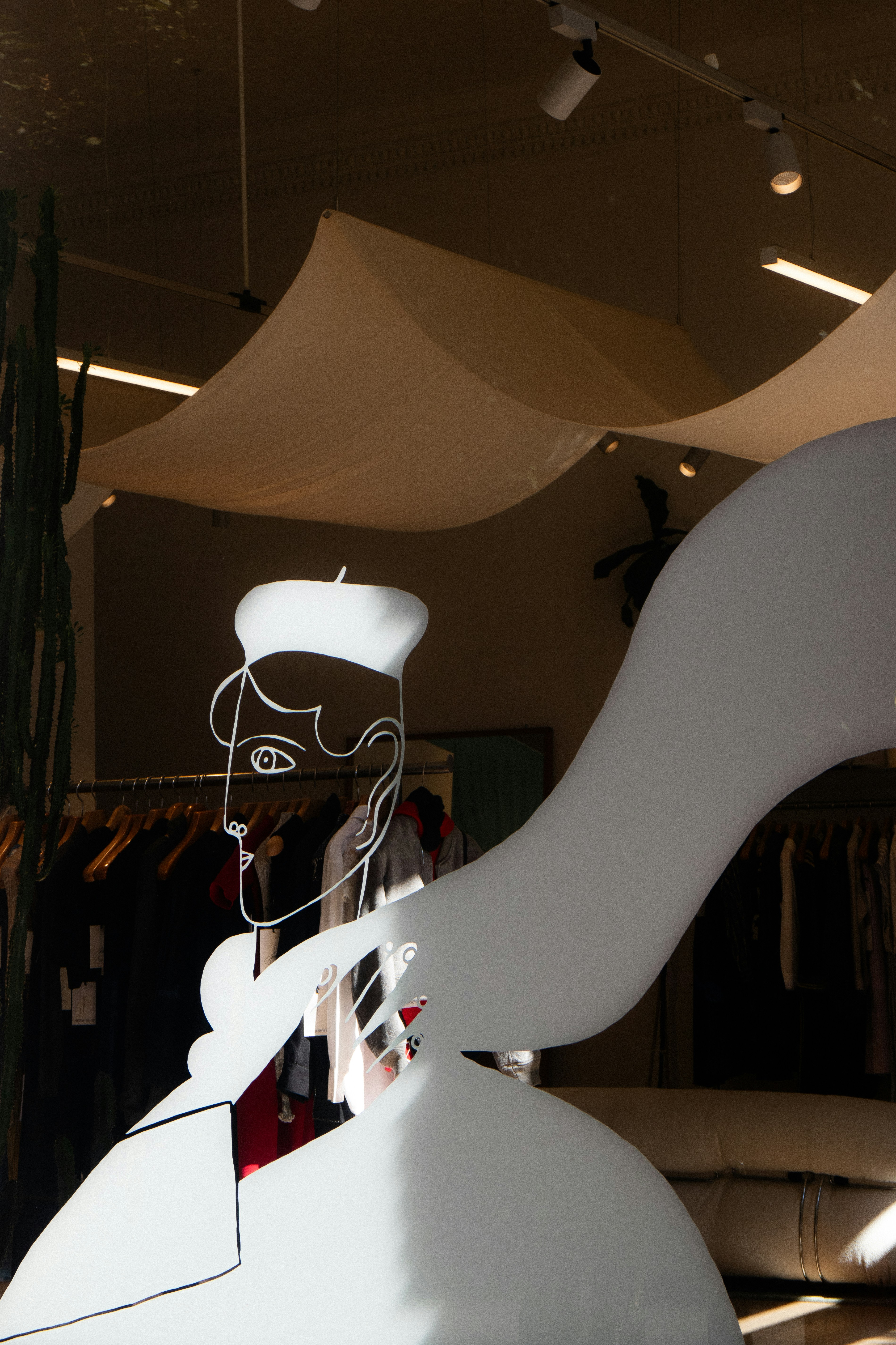 Abstract display with minimalist line art of a face