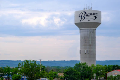 Branson water tower against a cloudy sky