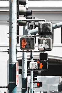 Traffic lights showing a red hand signal