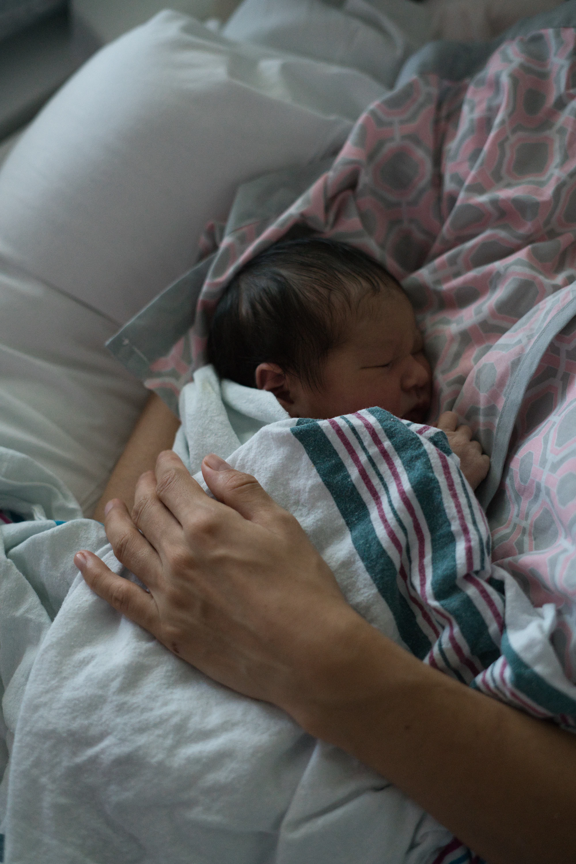 Newborn receiving neonatal care