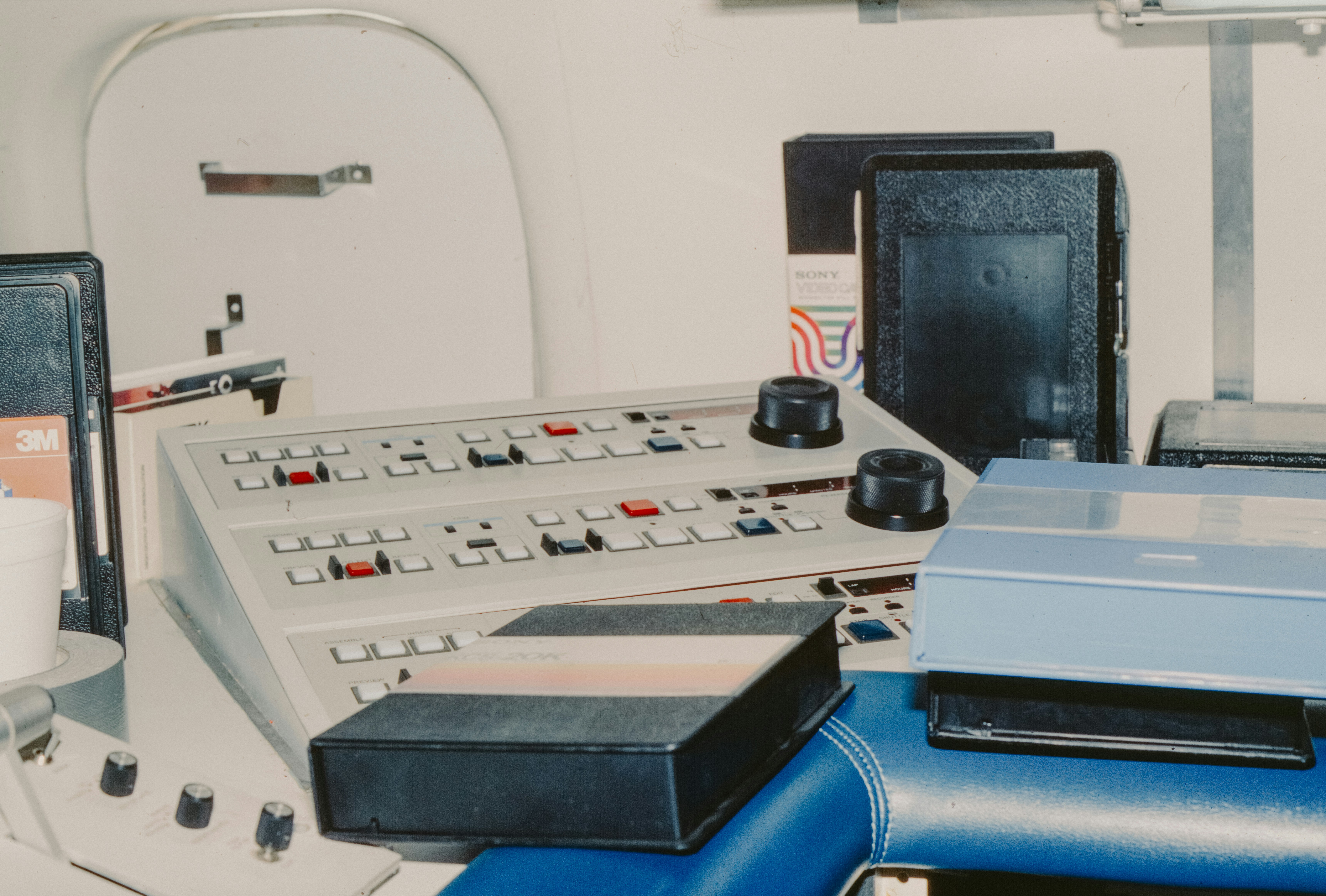 Control panel with buttons and knobs in a room