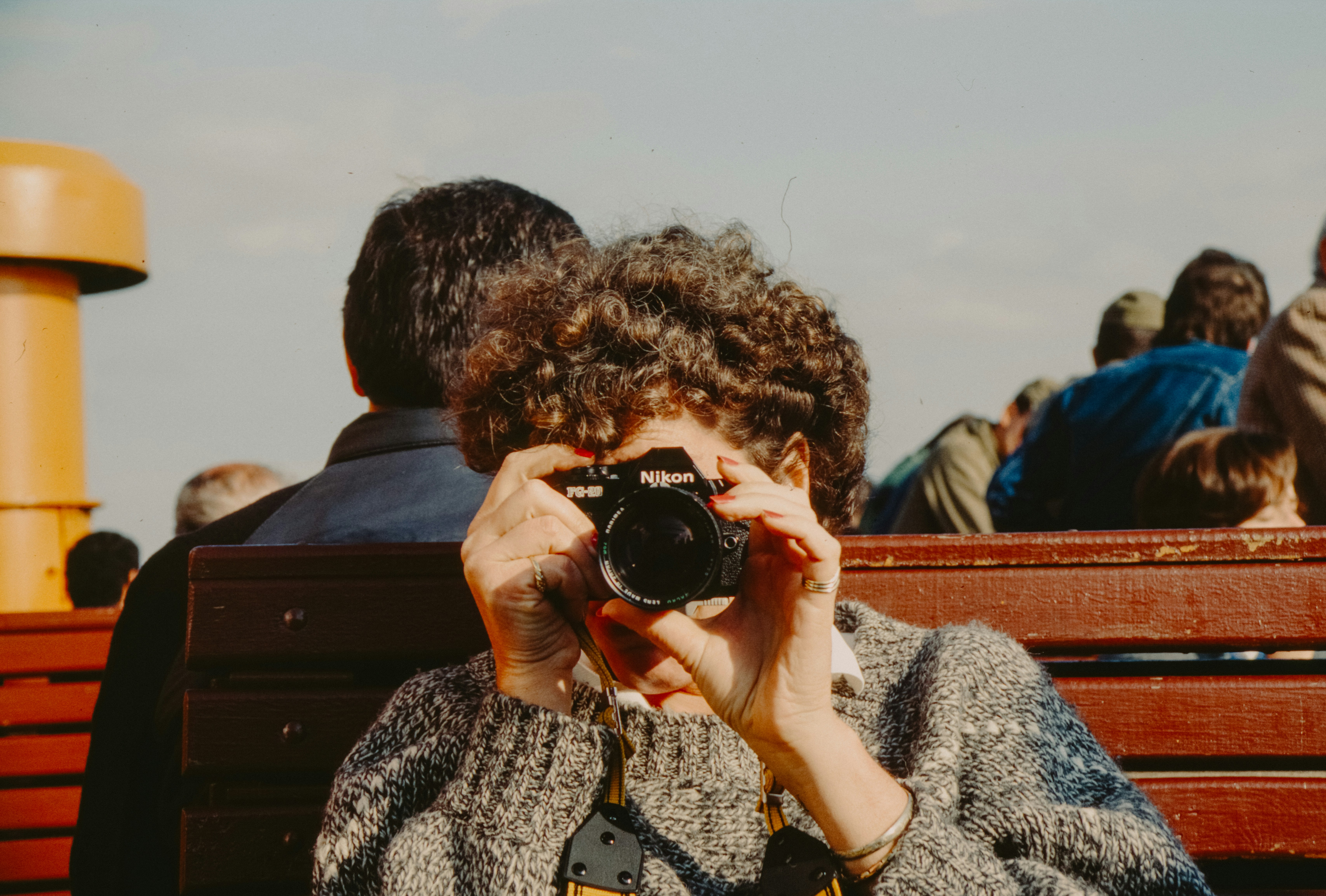 Woman taking a picture with a camera