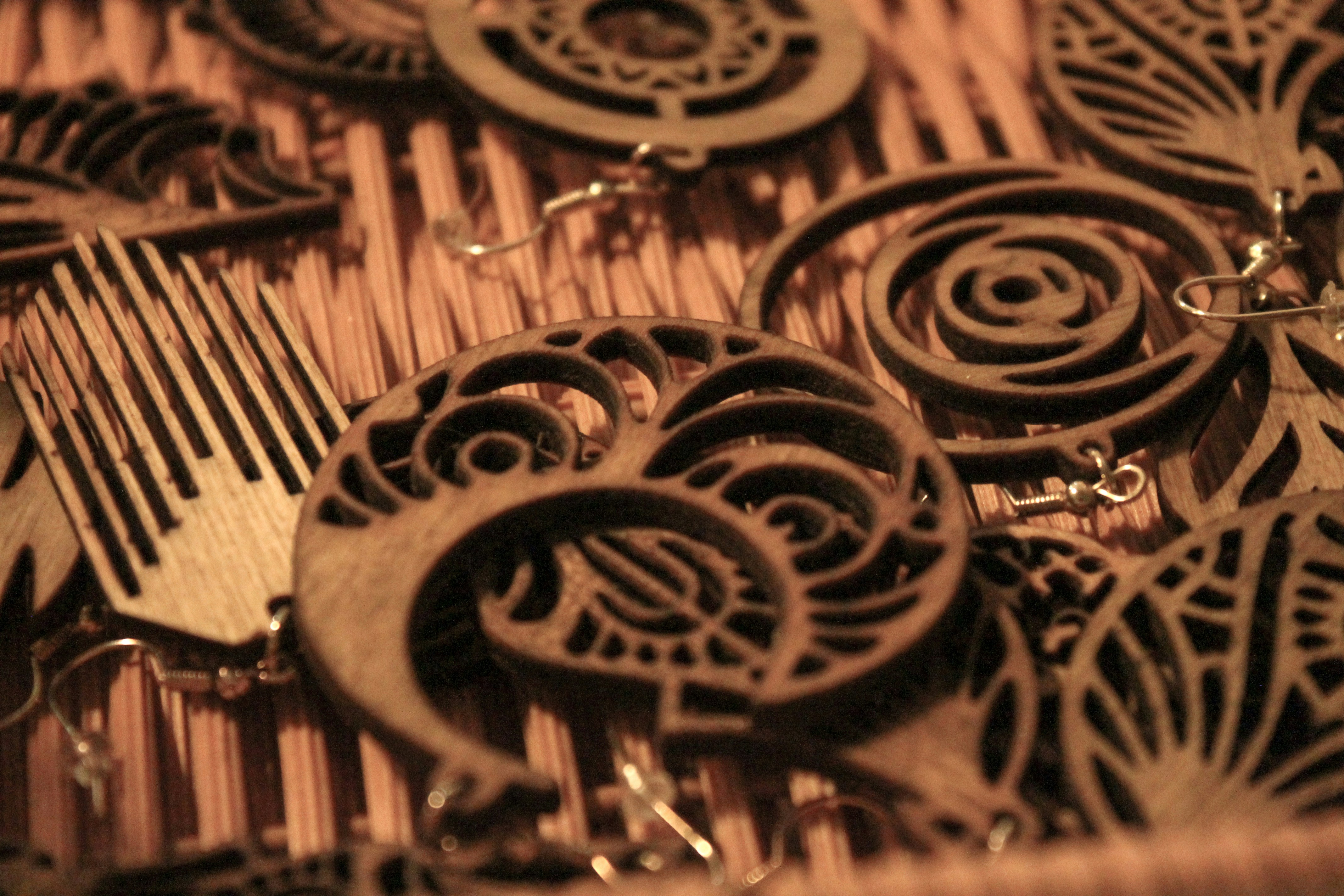 Assortment of intricate wooden laser-cut earrings