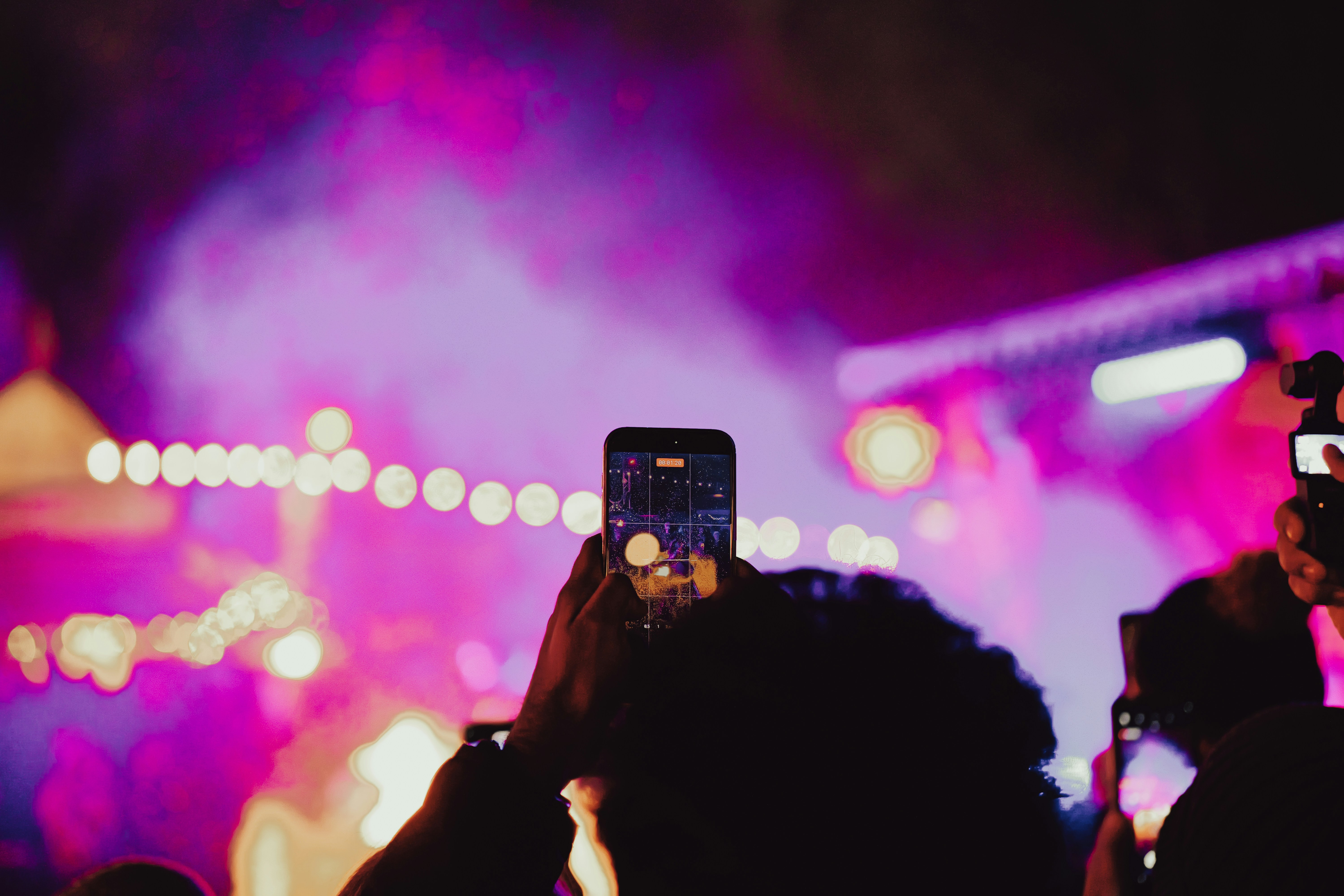People recording a concert with their phones - people-recording-a-concert-with-their-phones-31RHXSYhnJM