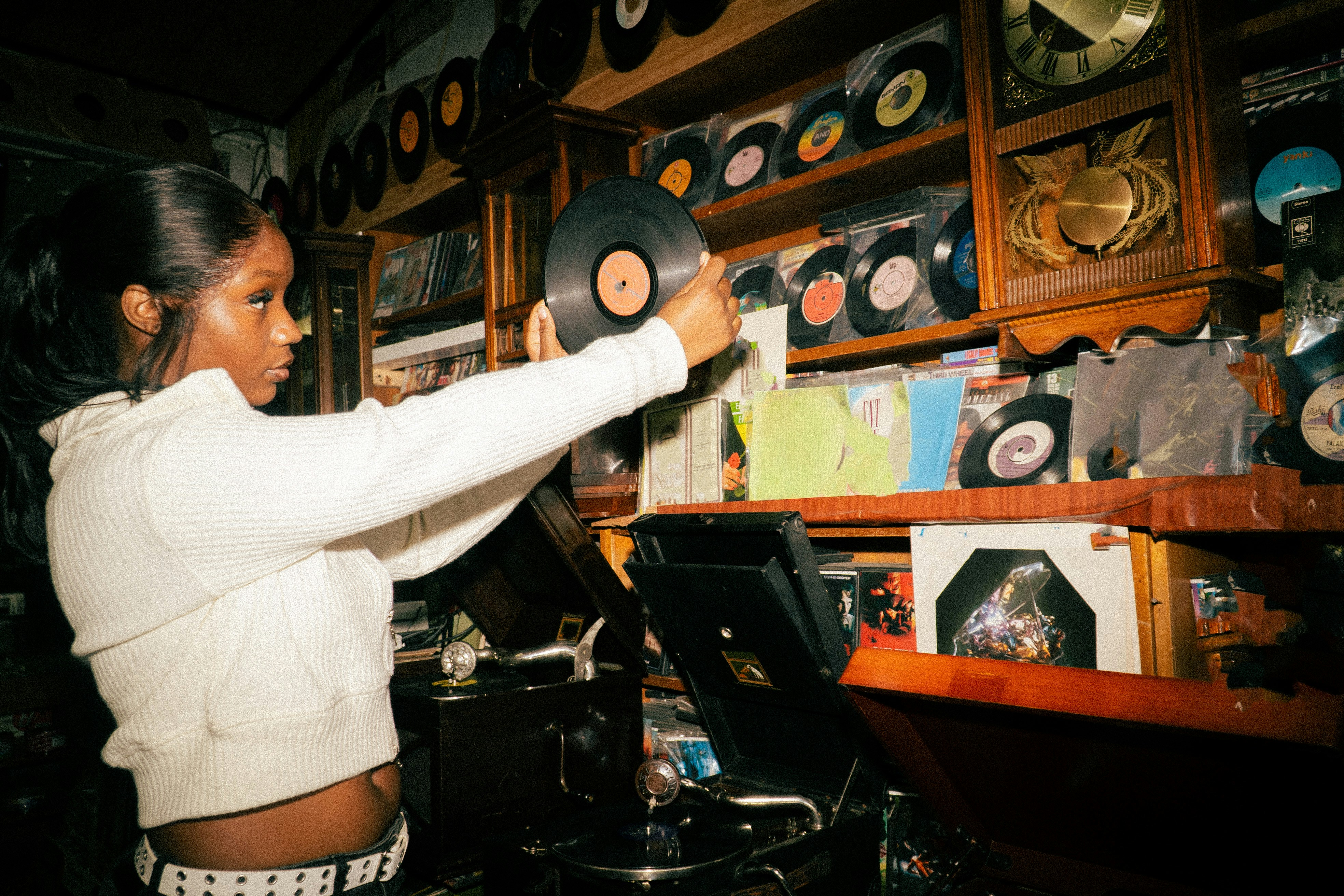 Young woman browsing records in a store