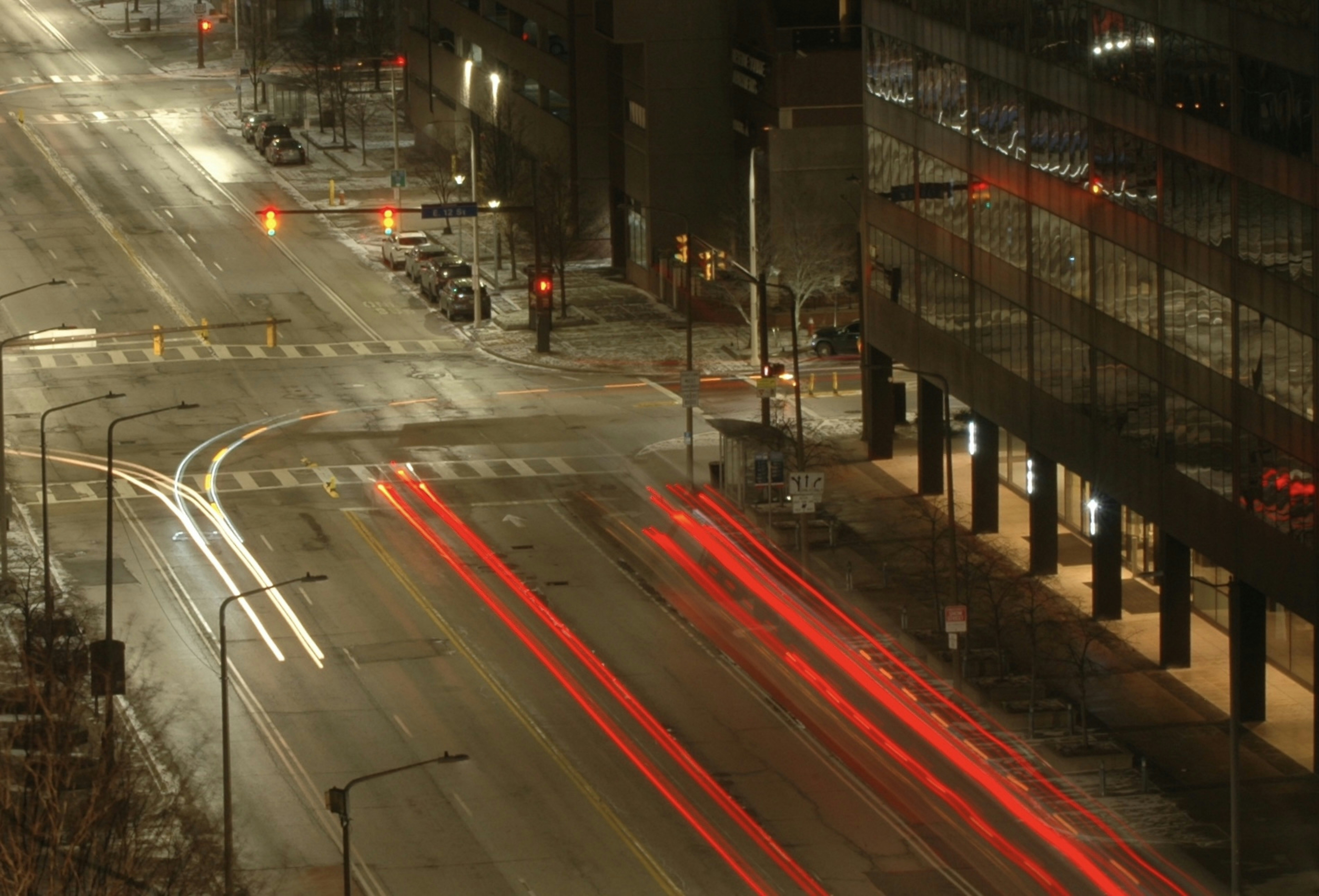 Streaks of car lights on a city street at night