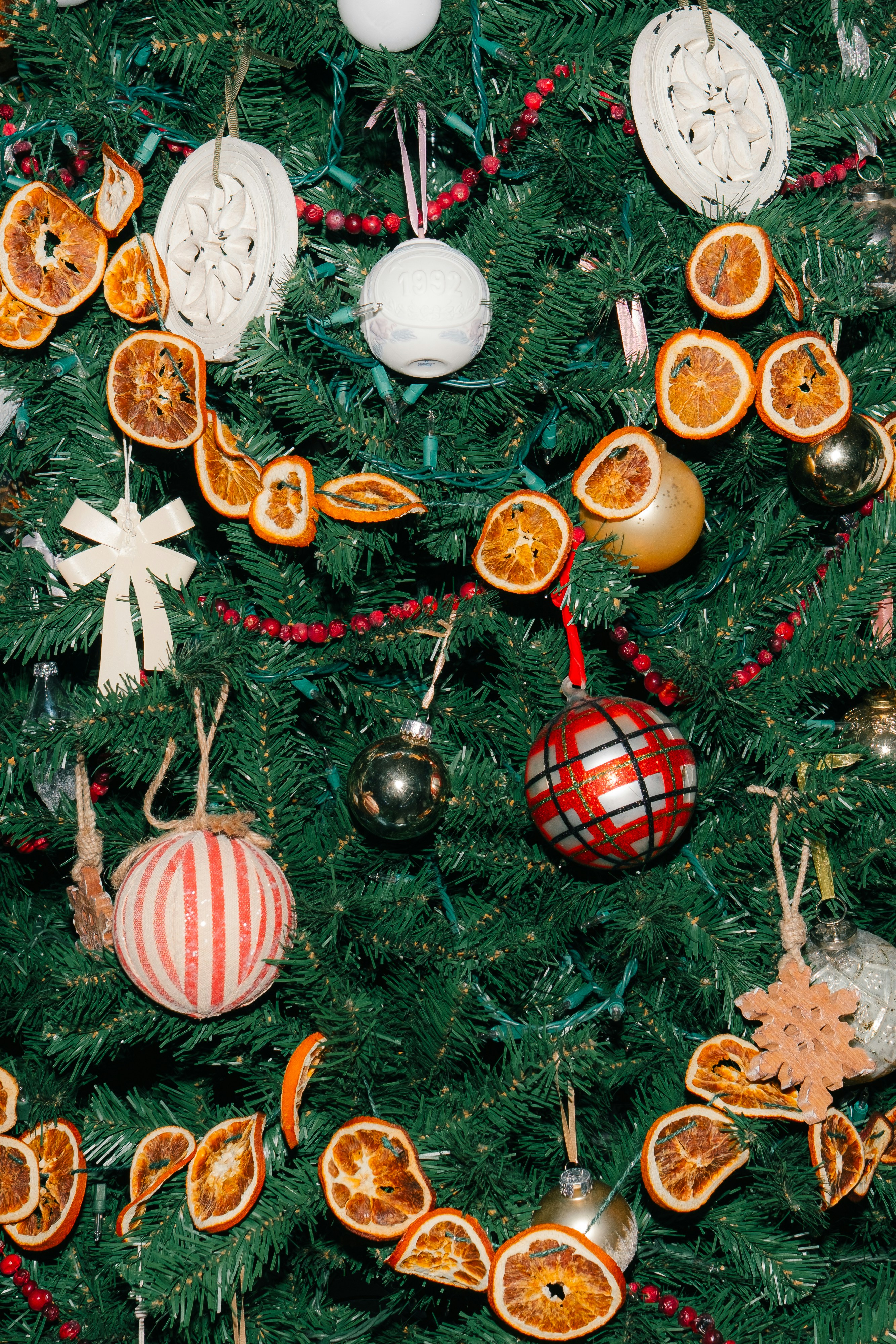 Christmas tree decorated with dried oranges and ornaments