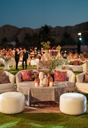 Elegant outdoor lounge area with seating and decor