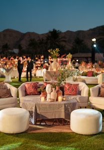 Elegant outdoor lounge area with seating and decor