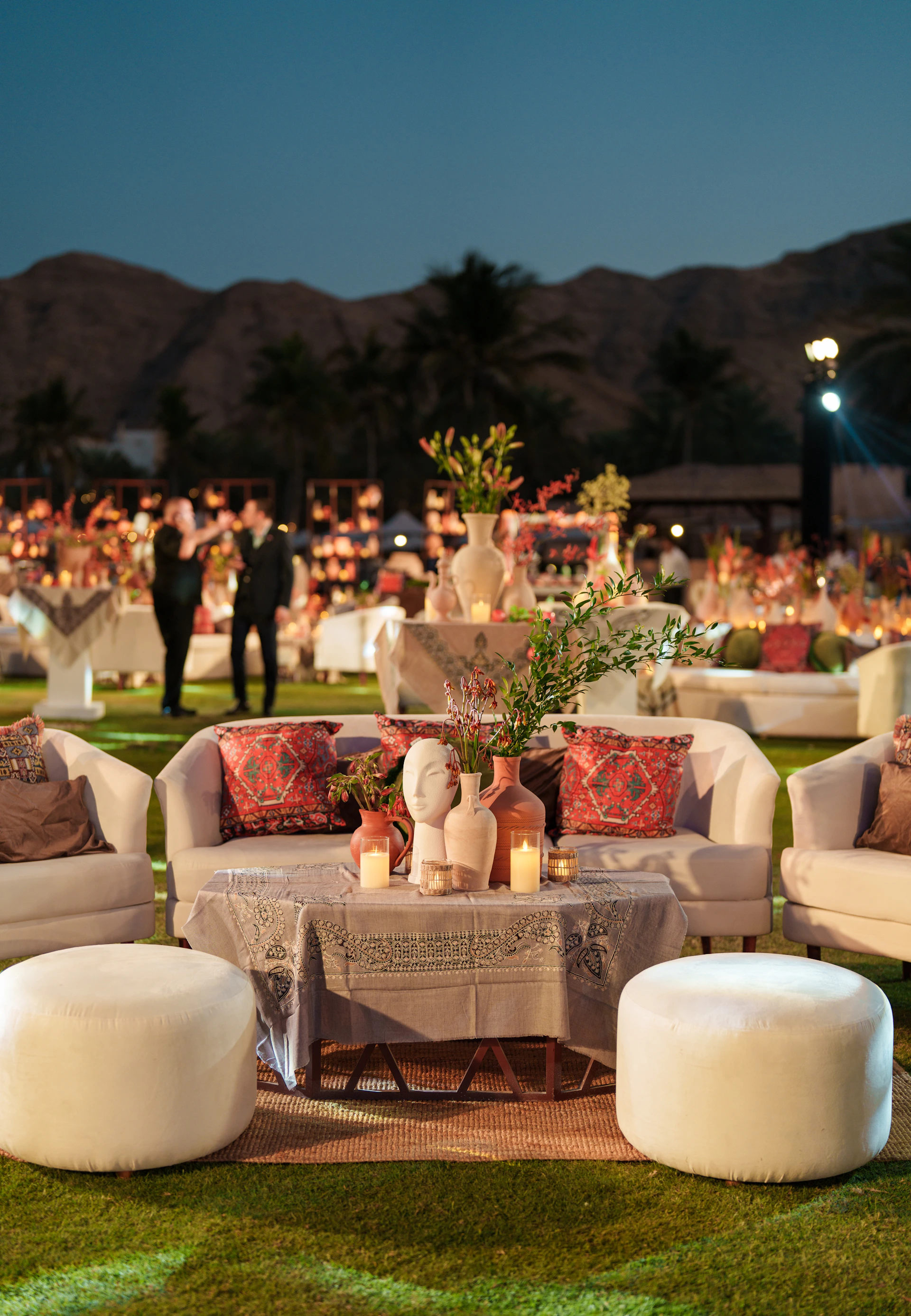 Elegant outdoor lounge area with seating and decor