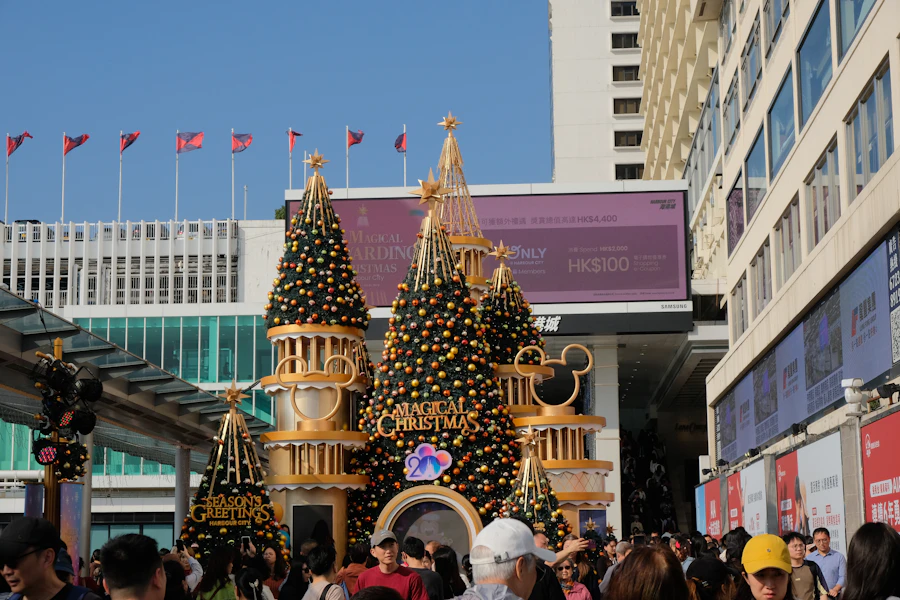 Elaborate Christmas light decorations illuminating a Hong Kong street at night
