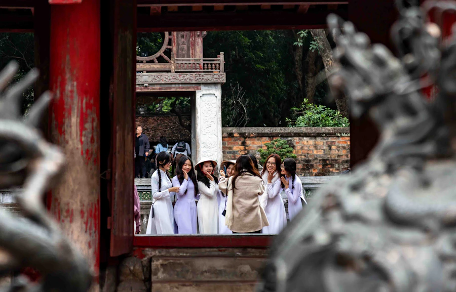 Vietnamese women in traditional ao dai at the Hung Kings Festival