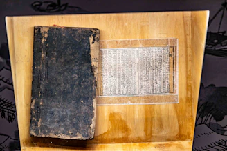 An old book and ancient manuscript on display