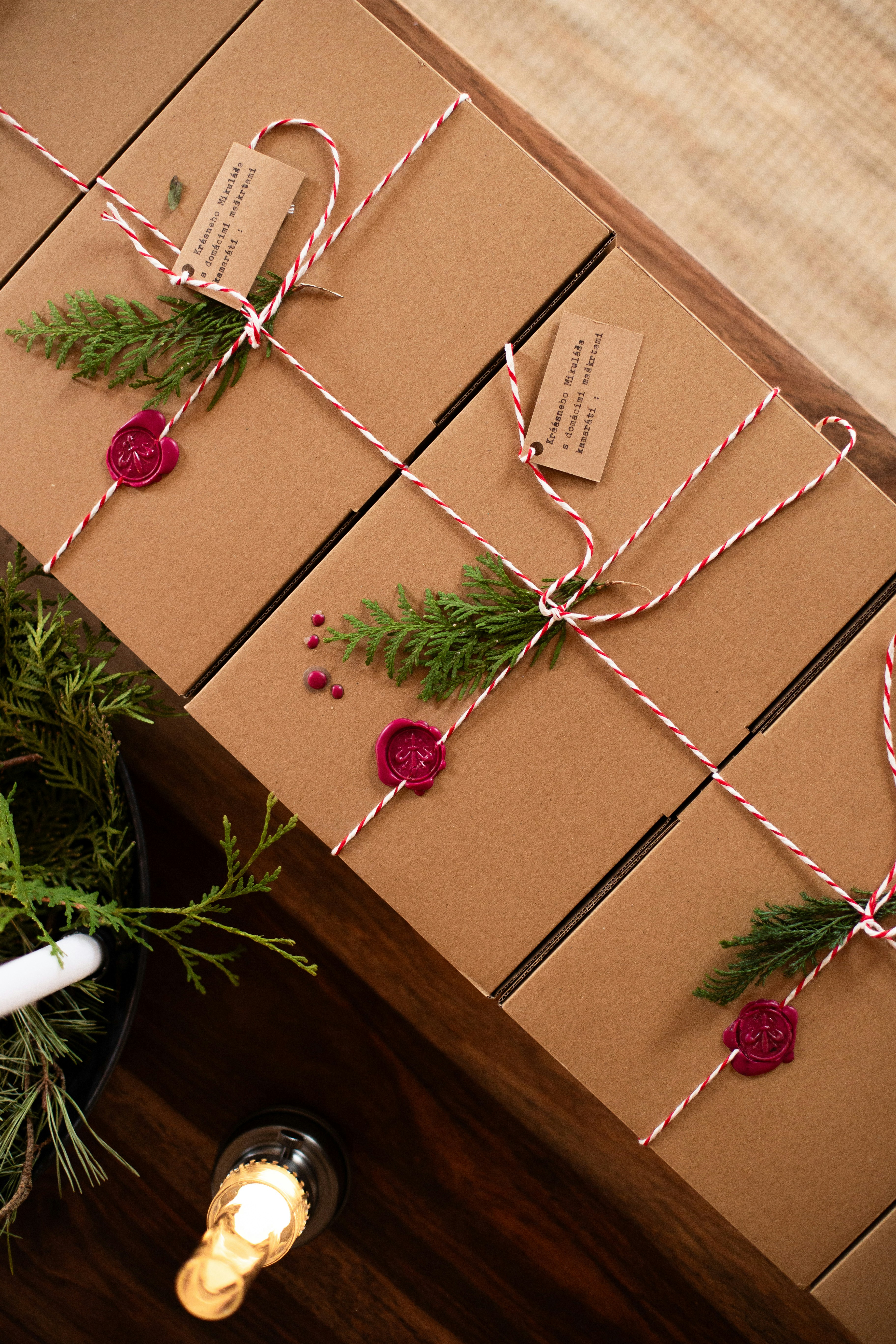 Brown gift boxes tied with red and white string
