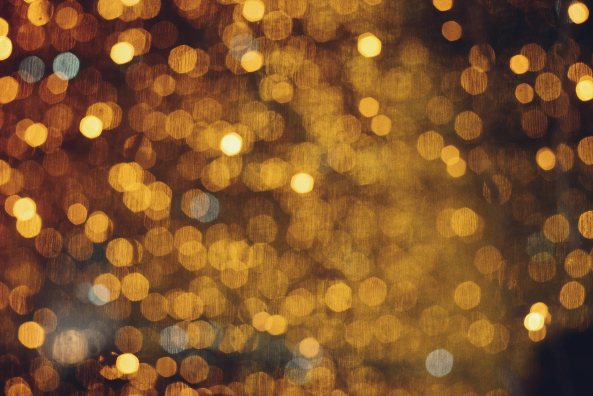 Blurred golden bokeh lights at night