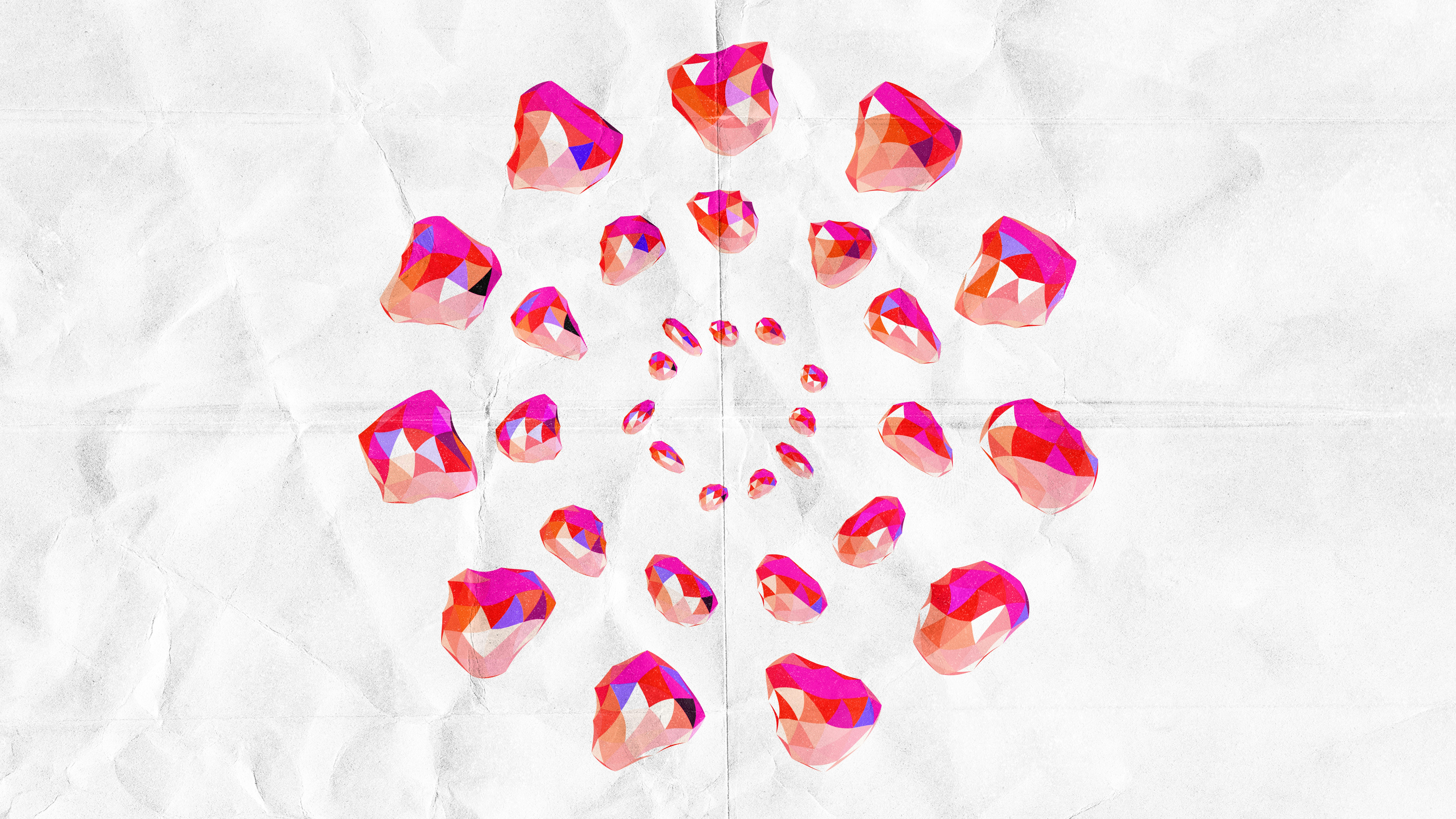 Pink crystal-like shapes arranged in a spiral pattern.